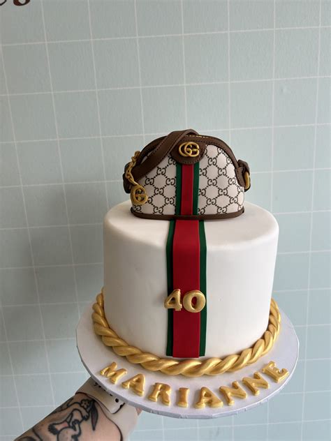 gateau gucci prix|black Gucci bag cake.